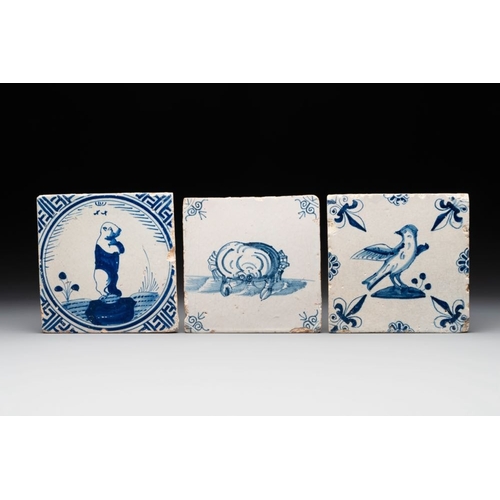 603 - Three blue and white Dutch Delft tiles with a bear, a crab and a bird, 17th C.Dim.: ca. 13 x 13 x 1,... 