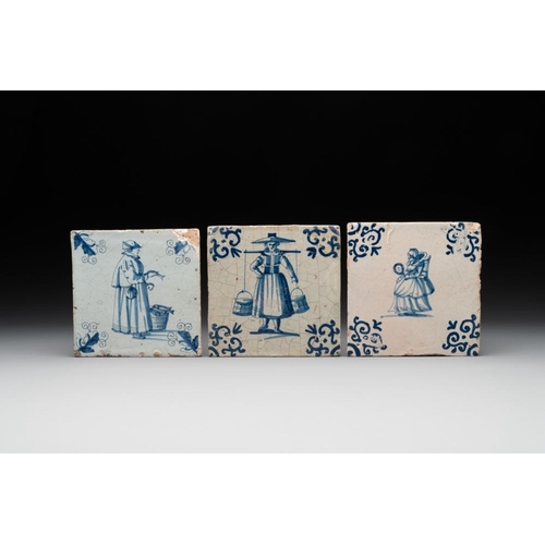 608 - Three blue and white Dutch Delft tiles with ladies, 17th C.Dim.: ca. 13 x 13 cm (each tile)... 