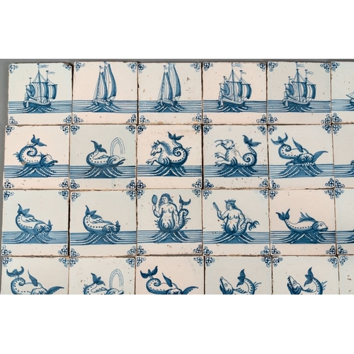 617 - A field of 30 Dutch Delft blue and white tiles with sea creatures and ships, 18th C.Dim.: 13 x 13 cm... 