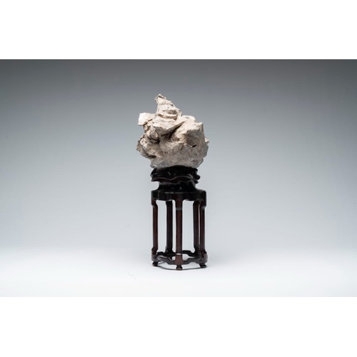 625 - A Chinese Taihu stone scholar's rock on wooden standH.: 44,5 cm (incl. stand)
Provenance: - From the... 