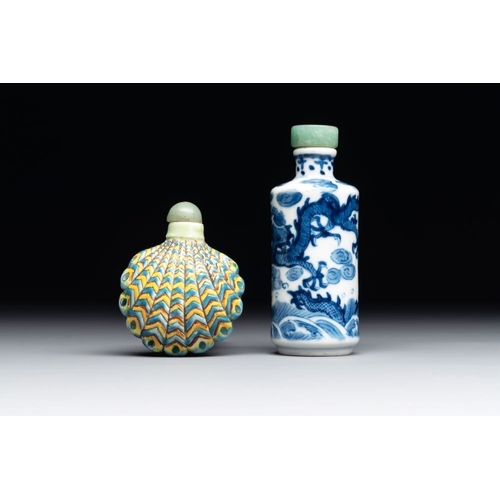 650 - A Chinese blue and white 'dragon' snuff bottle and a polychrome 'peacock' snuff bottle, Yongzheng ma... 