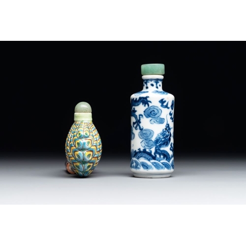 650 - A Chinese blue and white 'dragon' snuff bottle and a polychrome 'peacock' snuff bottle, Yongzheng ma... 