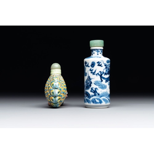 650 - A Chinese blue and white 'dragon' snuff bottle and a polychrome 'peacock' snuff bottle, Yongzheng ma... 