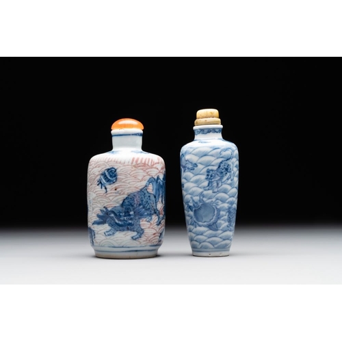 653 - Two Chinese blue, white and copper-red 'mythical animals' snuff bottles, Qianlong mark and of the pe... 