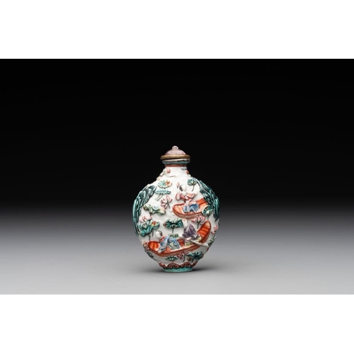 666 - A Chinese famille rose relief-molded snuff bottle with an animated river landscape, Jiaqing mark and... 