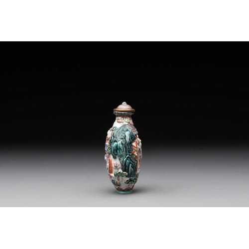 666 - A Chinese famille rose relief-molded snuff bottle with an animated river landscape, Jiaqing mark and... 