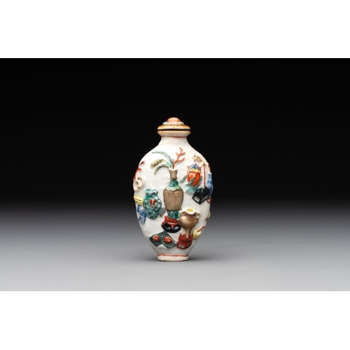 669 - A Chinese molded famille rose 'antiquities' snuff bottle and porcelain stopper, Qianlong mark, 19th ... 