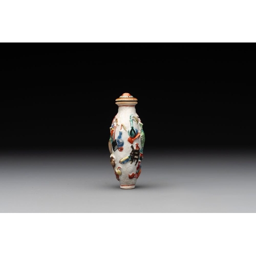 669 - A Chinese molded famille rose 'antiquities' snuff bottle and porcelain stopper, Qianlong mark, 19th ... 