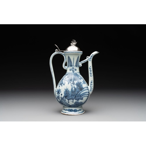 67 - A Chinese silver-mounted blue and white ewer with figures in a landscape, MingH.: 24,5 cm (incl. sil... 