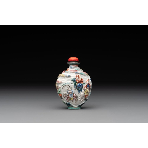 670 - A Chinese famille rose relief-molded snuff bottle with narrative design, Xianfeng mark and of the pe... 