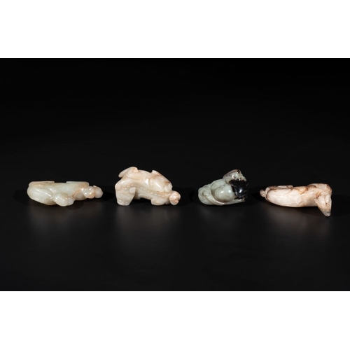 692 - Five Chinese jade carvings with four wooden stands, 19th C.(from left to right, excl. stands)Dim.: 7... 