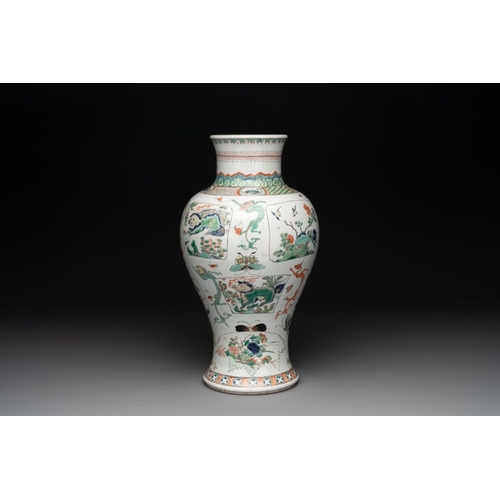 7 - A fine Chinese famille verte 'mythical creatures' vase on a reticulated wooden stand, KangxiH.: 47 c... 