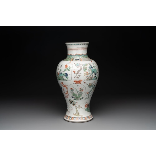 7 - A fine Chinese famille verte 'mythical creatures' vase on a reticulated wooden stand, KangxiH.: 47 c... 