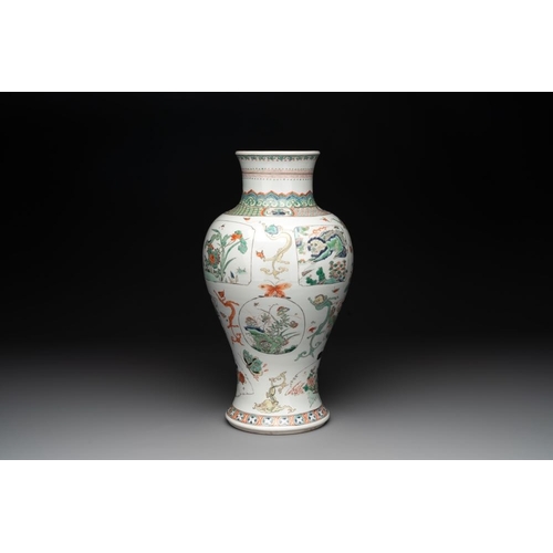 7 - A fine Chinese famille verte 'mythical creatures' vase on a reticulated wooden stand, KangxiH.: 47 c... 