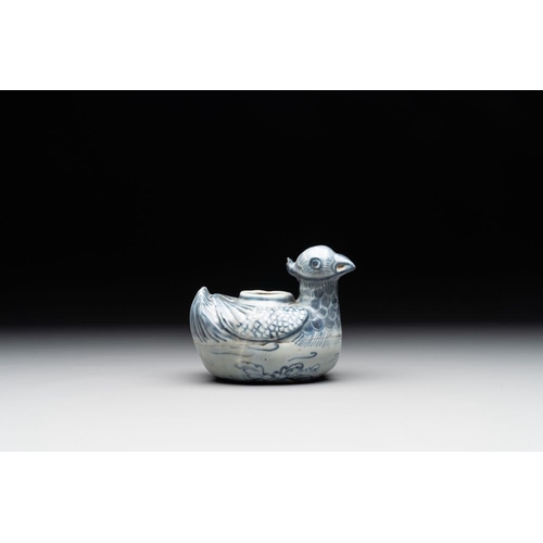 71 - A Chinese blue and white 'double mandarin duck' ewer or water dropper on wooden stand, Ming, ca. 150... 