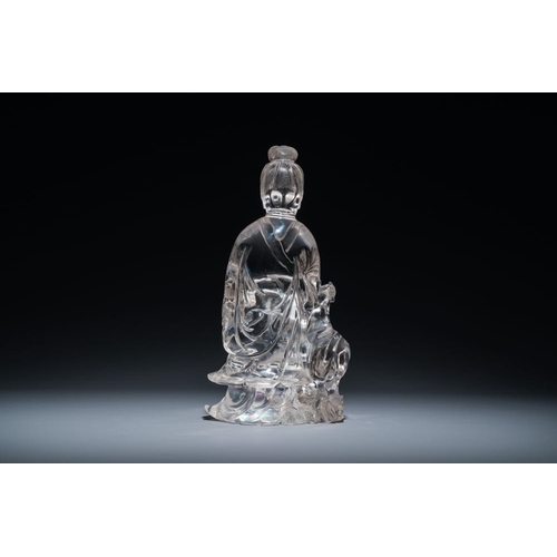 711 - A Chinese rock crystal sculpture of Lan Caihe on wooden stand, 19th C.H.: 32 cm (incl. stand)H.: 27 ... 