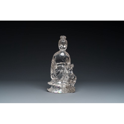 711 - A Chinese rock crystal sculpture of Lan Caihe on wooden stand, 19th C.H.: 32 cm (incl. stand)H.: 27 ... 