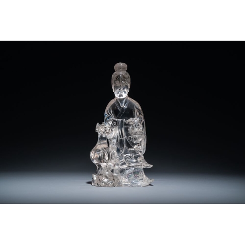 711 - A Chinese rock crystal sculpture of Lan Caihe on wooden stand, 19th C.H.: 32 cm (incl. stand)H.: 27 ... 