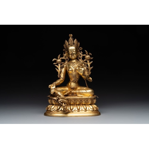 724 - A Sino-Tibetan gilt bronze Tara on double lotus throne, 18/19th C.H.: 32 cm
Weight: 5342 grams... 