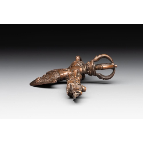 741 - A Tibetan bronze and cast iron ritual dagger or 'phurba', 18/19th C.L.: 13,5 cm -H.: 21,5 cm (excl. ... 