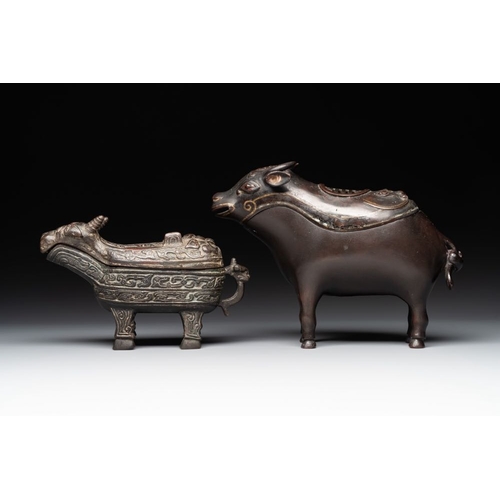 751 - Two Chinese bronze buffalo-form vessels and covers, 'xizun ', MingDim.: 26 x 8 x 20,3 cm (the talles... 