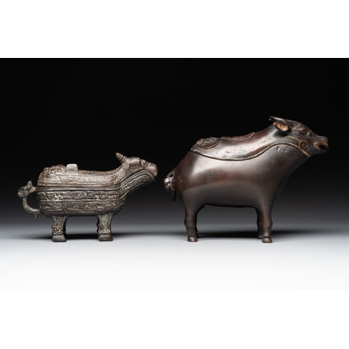 751 - Two Chinese bronze buffalo-form vessels and covers, 'xizun ', MingDim.: 26 x 8 x 20,3 cm (the talles... 