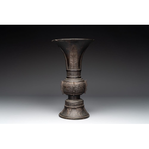 755 - A Chinese archaistic bronze 'gu' vase with relief design, MingH.: 35,3 cm
Weight: 5694 grams
... 