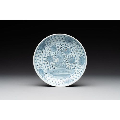 77 - A Chinese blue and white 'phoenix' dish and two 'Buddhist lion' and 'peony' plates, Hongzhi/ZhengdeD... 