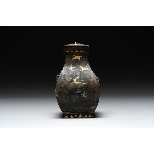 772 - A rare Chinese archaic partially gilt bronze ritual wine vessel and cover, 'fang hu ', HanH.: 17 cm ... 