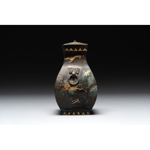 772 - A rare Chinese archaic partially gilt bronze ritual wine vessel and cover, 'fang hu ', HanH.: 17 cm ... 