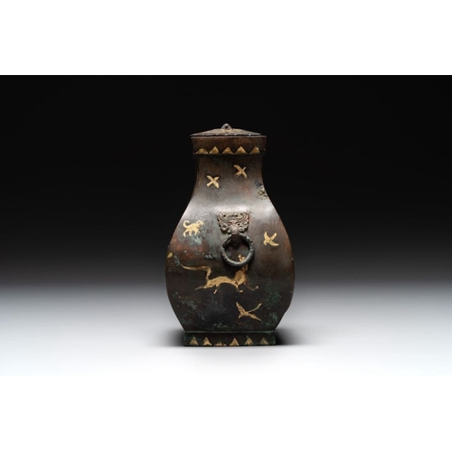 772 - A rare Chinese archaic partially gilt bronze ritual wine vessel and cover, 'fang hu ', HanH.: 17 cm ... 