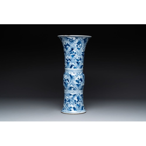 906 - A Chinese blue and white 'landscape' 'gu' vase, KangxiH.: 45 cm