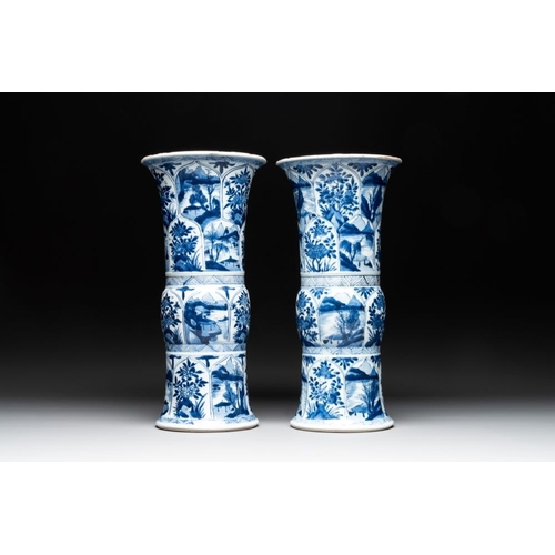 907 - Two Chinese blue and white 'gu' vases with landscape and floral panels, KangxiH.: 34 cm... 