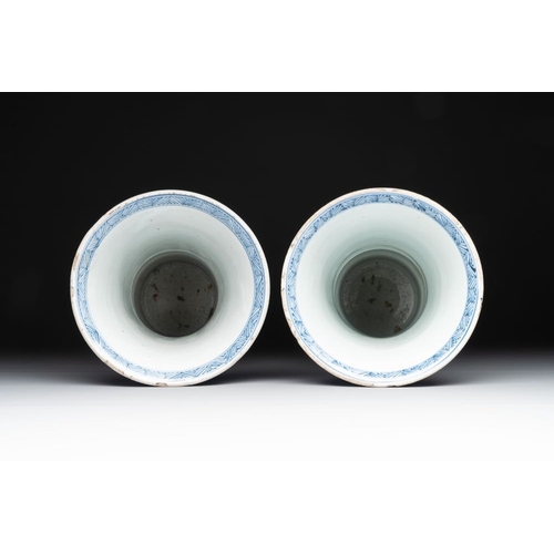 907 - Two Chinese blue and white 'gu' vases with landscape and floral panels, KangxiH.: 34 cm... 