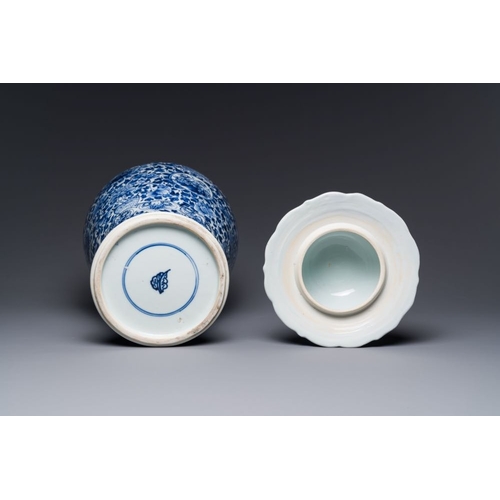 908 - A Chinese blue and white vase and cover with floral design, KangxiH.: 52 cm