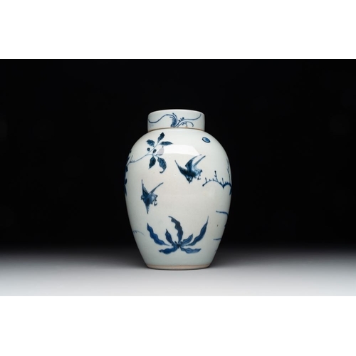 922 - A Chinese blue and white jar and cover with birds among flowering branches, Transitional periodH.: 1... 