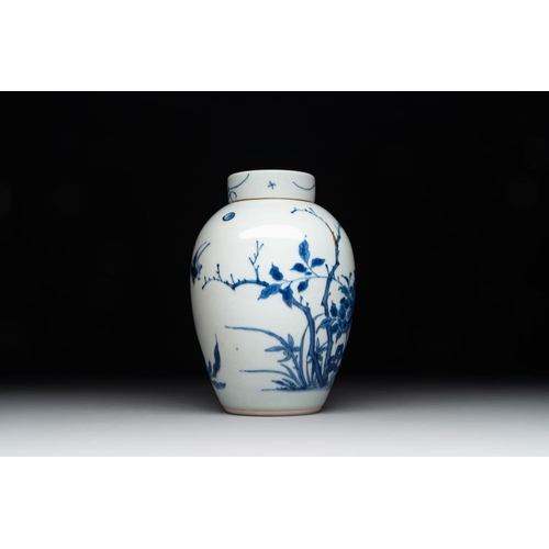 922 - A Chinese blue and white jar and cover with birds among flowering branches, Transitional periodH.: 1... 