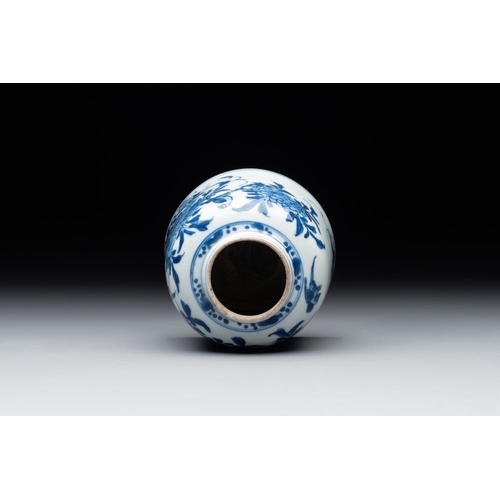 927 - A Chinese blue and white bell-shaped  water pot with birds among flowering branches, KangxiDia.: 9 -... 