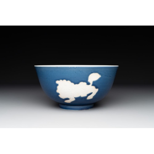 935 - A Chinese powder blue-ground biscuit, blue and white 'Buddhist lion' bowl, Xuande mark, KangxiDia.: ... 