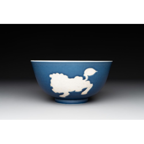 935 - A Chinese powder blue-ground biscuit, blue and white 'Buddhist lion' bowl, Xuande mark, KangxiDia.: ... 