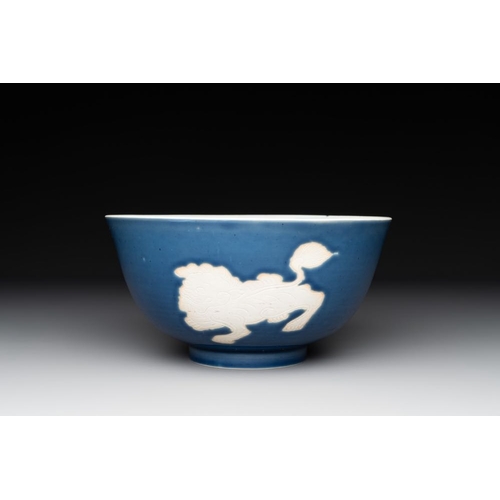 935 - A Chinese powder blue-ground biscuit, blue and white 'Buddhist lion' bowl, Xuande mark, KangxiDia.: ... 