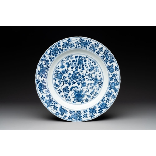 939 - A Chinese blue and white 'four seasons' dish, Kangxi mark and of the periodDia.: 35,5 cm... 