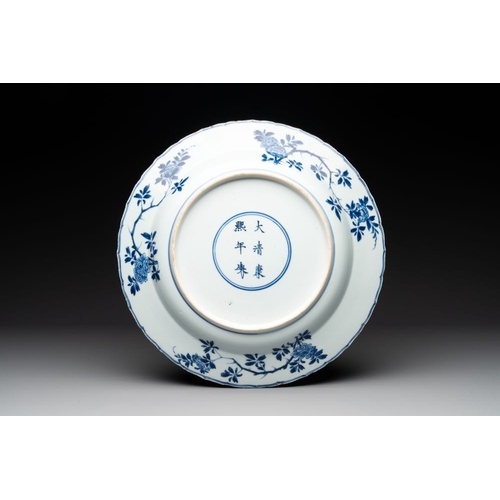 939 - A Chinese blue and white 'four seasons' dish, Kangxi mark and of the periodDia.: 35,5 cm... 