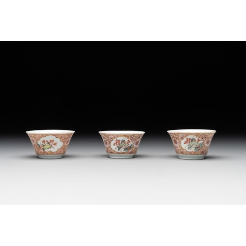 975 - Seven Chinese blue, white and famille rose cups, six saucers and two English-decorated jarlets, Kang... 