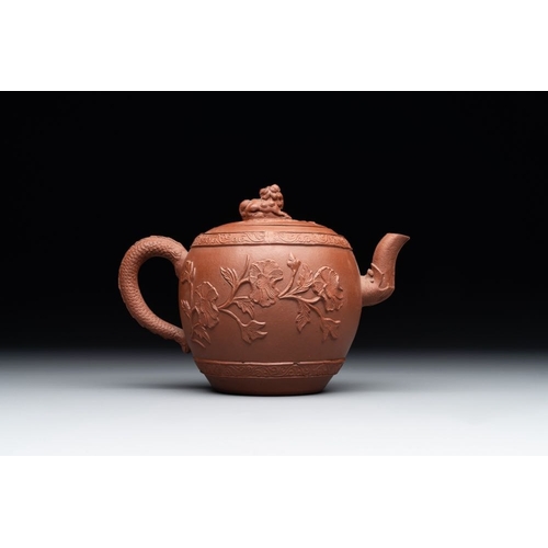 977 - A Chinese Yixing stoneware teapot with relief design, KangxiL.: 15,5 cm - H.: 10,5 cm... 