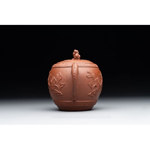 977 - A Chinese Yixing stoneware teapot with relief design, KangxiL.: 15,5 cm - H.: 10,5 cm... 