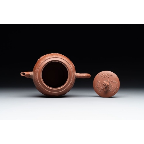 977 - A Chinese Yixing stoneware teapot with relief design, KangxiL.: 15,5 cm - H.: 10,5 cm... 