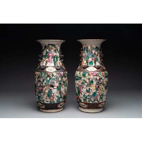 993 - Seven various Chinese Nanking blue and white, famille rose and verte crackle-glazed vases, 19th C.H.... 