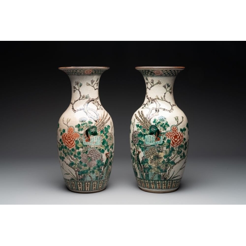 994 - A pair of Chinese Nanking famille verte crackle-glazed vases, a famille rose vase and a celadon-grou... 