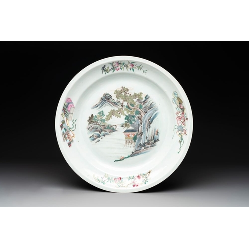 996 - A Chinese famille rose 'mountainous river landscape' dish, 19th C.Dia.: 39 cm